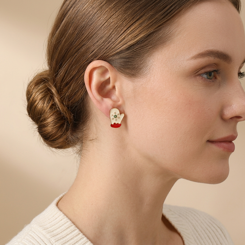 Model wearing Christmas Mitten Sparkle Studs in side profile