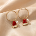 Santa hat charm hoop earrings on champagne satin